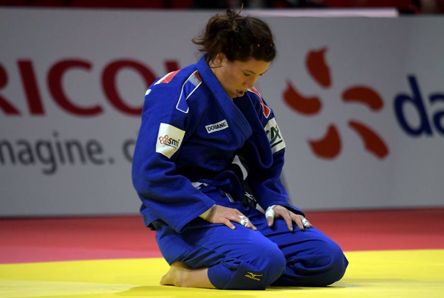 Helene Receveaux (Fra) sconfitta dalla Yoshida (giap)  nella semifinale dei 57 kg  AFP